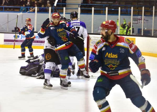 Capitals player/coach, Michal Dobron (background/left) scores goal number two.  He was assisted by Pavel Vorobyev (foreground) and Matt Tipoff. Picture: Jan Orkisz