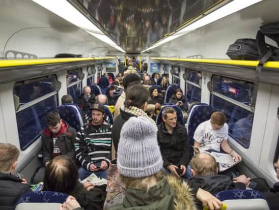 ScotRail has ordered two new fleets of trains to help ease the crush. Picture: Robert Perry