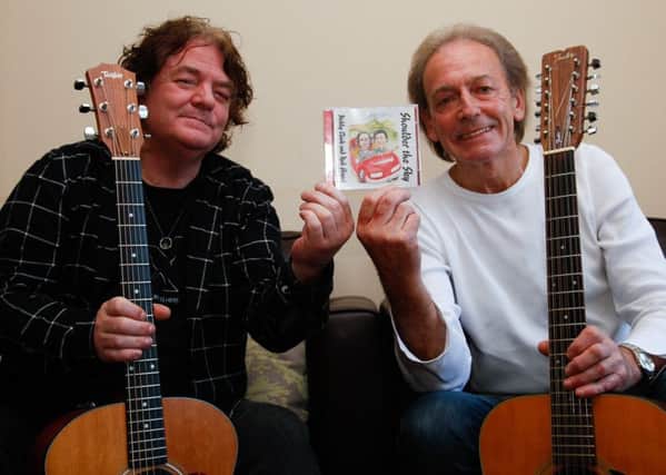 Rab Howat and Nobby Clark with their new album 'Shoulder The Sky'.