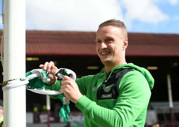Celtic's Leigh Griffiths celebrates at full time. Picture; SNS