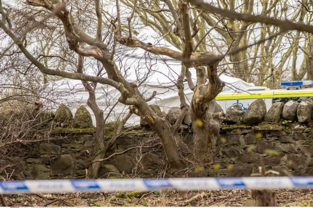 The forensics tent at the scene, just outside the walls of the estate Picture; Deadline