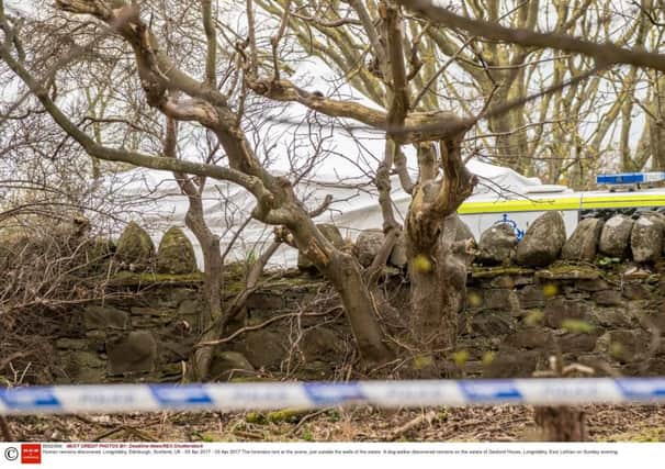 The forensics tent at the scene, just outside the walls of the estate Picture; Deadline