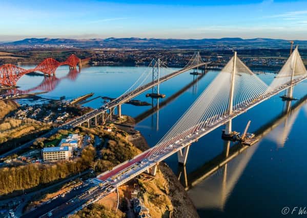 A view looking across North Queensferry and the three Forth bridges. The Queensferry Crossing is due to open later this year. Picture: Finlay Wells