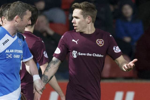 Sam Nicholson denied spitting at assistant referee Stephen Mitchell