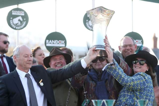 Deborah Thomson, far right, celebrates the win. Picture: PA