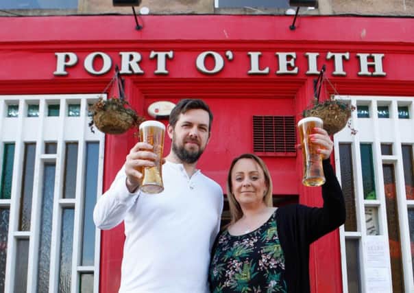Andrew and Gillian are stepping our from behind the Port OLeith bar. Picture: Toby Williams