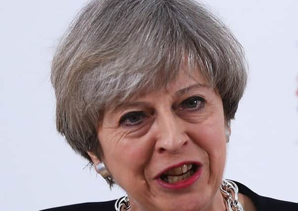 Theresa May: people uniting  (Photo by Matthew Lewis/Getty Images)