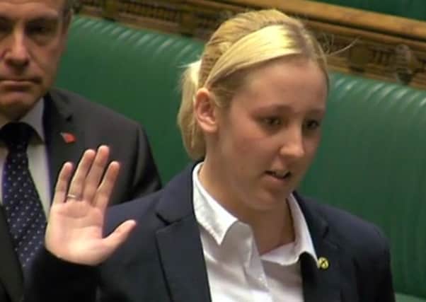 Mhairi Black of the SNP being sworn in as the MP for Paisley & Renfrewshire South .