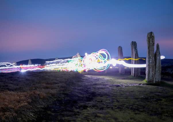 The Ring of Brodgar site on Orkney glows in the dark to mark World Heritage Day. PIC: Dig It! 2017/Tom O'Brien.