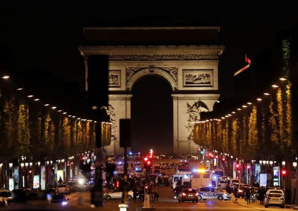 Police officers block the access to the Champs Elysees in Paris. Picture: AFP/Getty Images