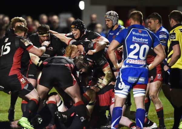 Somewhere beneath all these bodies is Edinburgh captain Grant Gilchrist scoring the winning try. Picture: Rob Casey/SNS