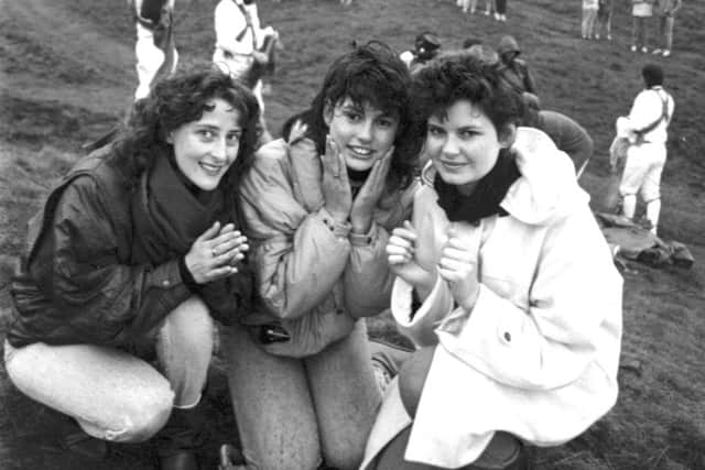 Three girls wash their face in the morning dew at the top of Arthur's Seat, 1987. One of three, Linda McLeod was less than happy to be there (see article)! Picture: Copyright TSPL
