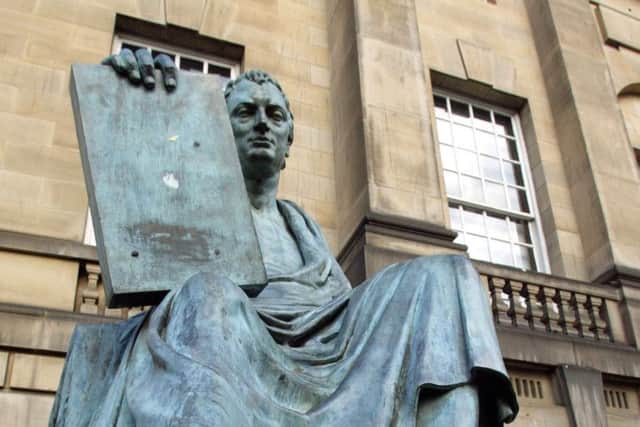 The bronze statue of Scottish philosopher David Hume in Edinburg. (AP Photo/Martin Cleaver)