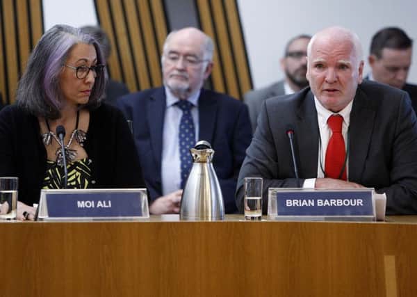 Moi Ali (left), Former Board Member and Brian Barbour (right), give evidence on the 2015/16 audit. Pic - Andrew Cowan/Scottish Parliament