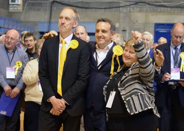 Four candidates will be elected Kevin Lang(Scottish Liberal Democrats) and his sister   Louise Young (Scottish Liberal Democrats) celebrate with MSP Alex Cole Hamilton. Picture; Neil Hanna