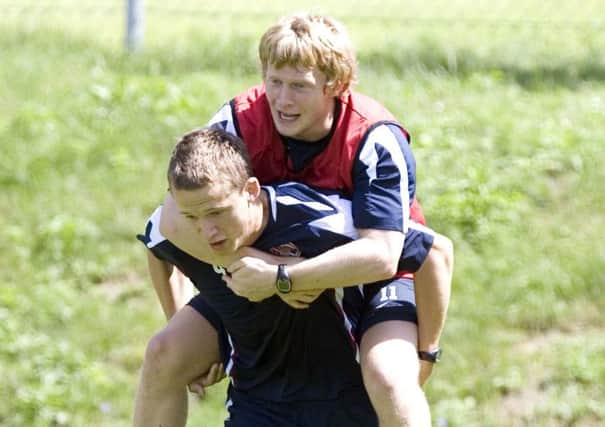 Christophe Berra and Andrew Driver share a laugh at training during their time together at Hearts in 2007. Pic: SNS