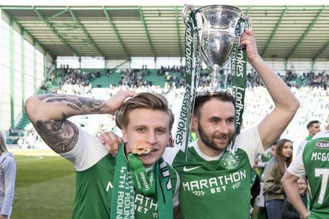 Keatings celebrates with the league trophy and his best mate Jason Cummings at Easter Road