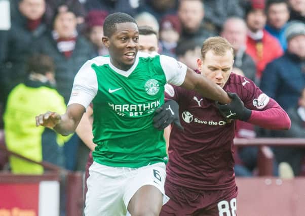 Marvin Bartley gets the better of Hearts' Malaury Martin