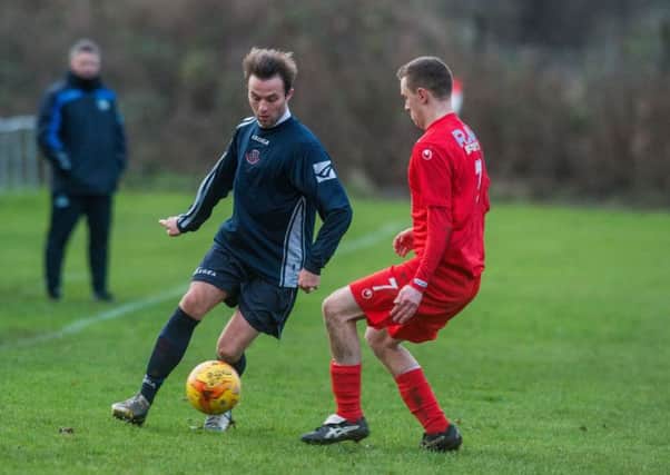 Jack Downie, left, missed a late penalty for Strollers. Pic: TSPL