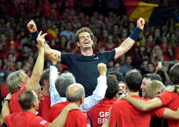 Andy Murray celebrates Davis Cup victory with Team GB. Picture: Jane Barlow