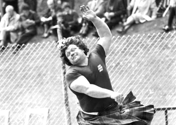 Hamish Davidson from Nairn competing in the hammering throwing at the Milk International Highland Games in Princes Street Gardens, Edinburgh.