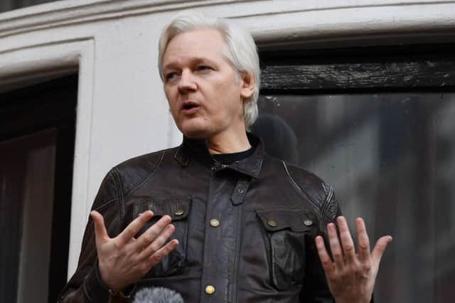 Wikileaks founder Julian Assange speaks on the balcony of the Embassy of Ecuador in London. Picture: Getty Images