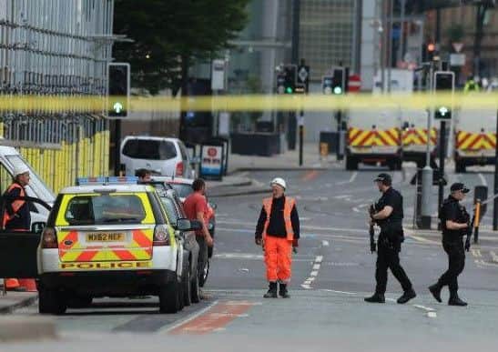 Experts have stressed the importance of having meaningful dialogue with your children about terrorism. Picture: PA
