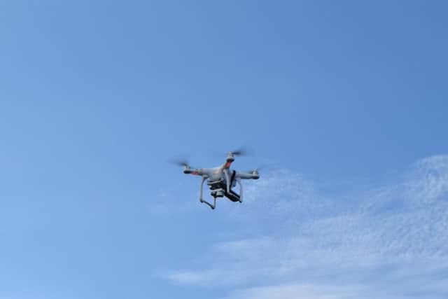 Police have launched a public appeal after a drone was involved in a near miss with a commercial jet at Edinburgh Airport.
