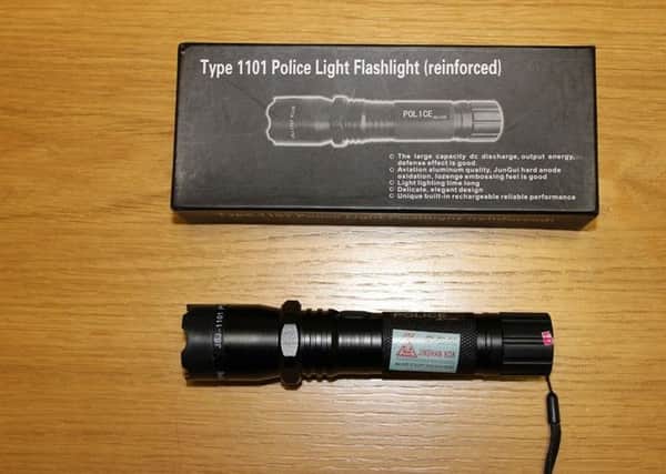A stun gun disguised as a torch, similiar to the one police found at Mr Homer's home.