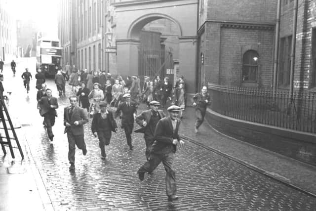 Workers head for home after their shift at Castle Mills. Picture: TSPL