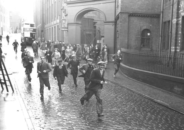 Workers head for home after their shift at Castle Mills. Picture: TSPL