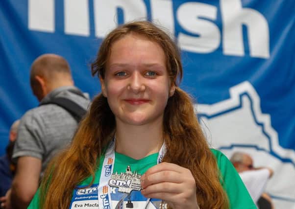 Eva MacFarlane  (13) after completing the 5k at The Edinburgh Marathon Festival. Picture:TSPL