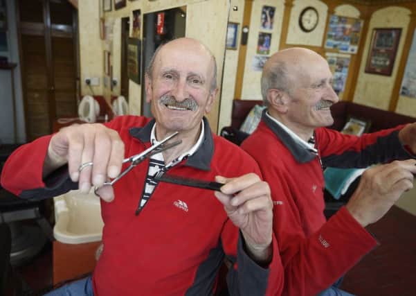 Alfonso Russo has owned the shop with Sam since 1970. Picture: Greg Macvean