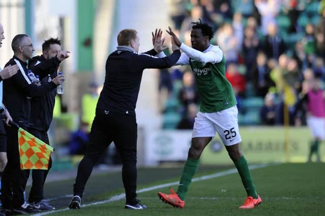 Neil Lennon is a big fan of Efe Ambrose, and the manager sees the Nigerian, right, as a key player