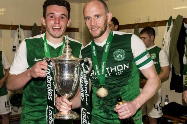 McGinn and David Gray with the Championship trophy