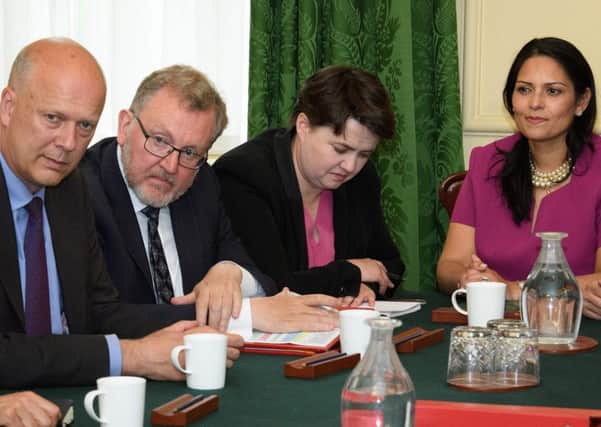 Ruth Davidson flanked by Chris Grayling, David Mundell and Priti Patel at the cabinet table in Downing Street. Picture: Getty