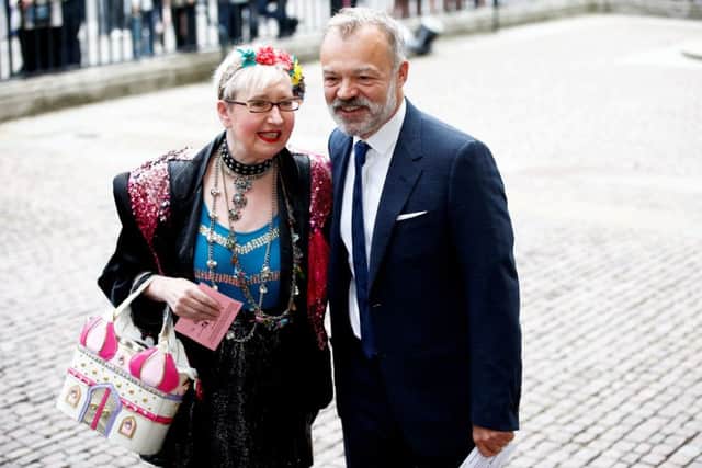 Sue Pollard and Graham Norton arrive for a service of thanksgiving at Westminster Abbey. Picture: SWNS