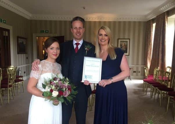Alasdair and Louise Jack with Melanie Leckie, celebrant of Humanist Society Scotland, at their wedding at Cromlix House, Dunblane. Picture: Contributed