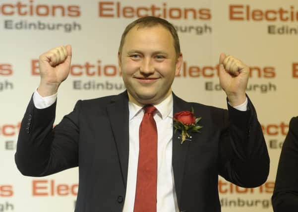 Labour's 
Ian Murray celebrates his win. Picture:
 Neil Hanna