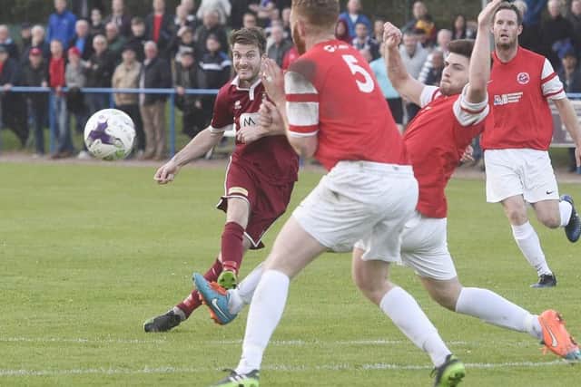 Kenny Fisher curls home the winner for Tranent. Pic: Greg Macvean
