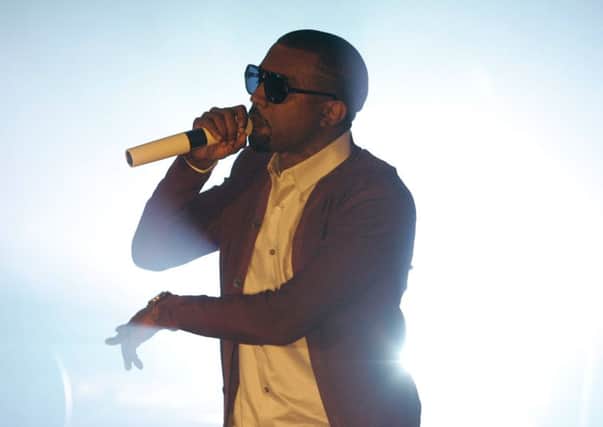 Hip-hop mogul Kanye West celebrates his birthday today. (AP Photo/Brian Kersey)