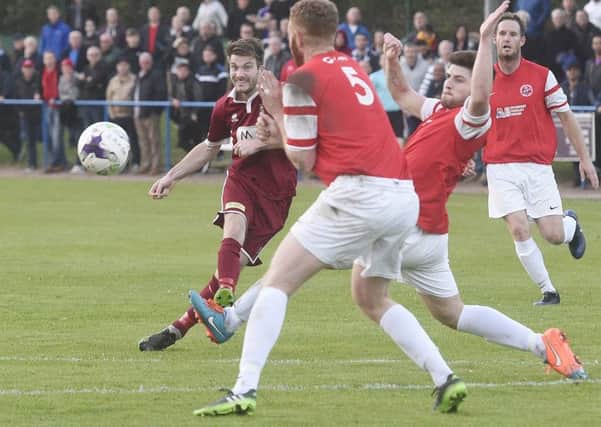 Kenny Fisher scores the only goal of the Fife and Lothians Cup Final against Broxburn. Picture: Greg Macvean