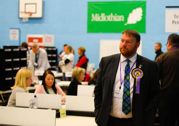 SNP Midlothian candidate Owen Thompson cut a dejected figure.