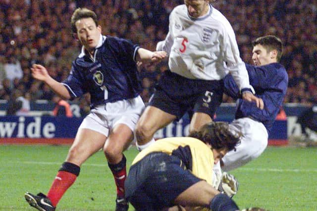 Mark Burchill, right, played in both legs as Scotland met England in a European Championship play-off in 1999