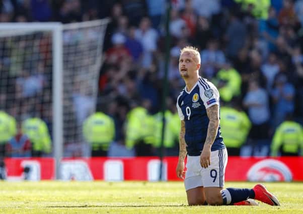 Leigh Griffiths cuts a dejected figure at full time