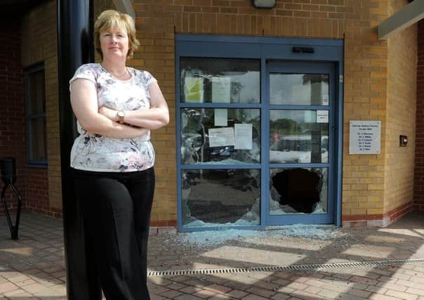 Dr Julie Catnach stands outside the vandalised Liberton Medical Centre. Picture: Lisa Ferguson