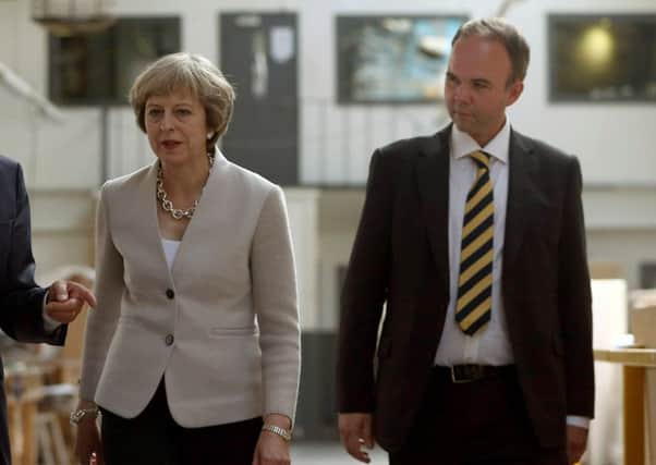 Theresa May and Gavin Barwell. Picture: Neil Hall/PA Wire