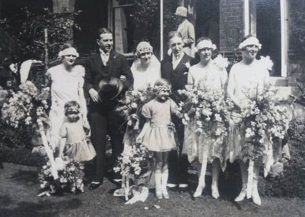 This fashionable 1920s wedding was among events captured in the photo album. PIC: National Records of Scotland.
