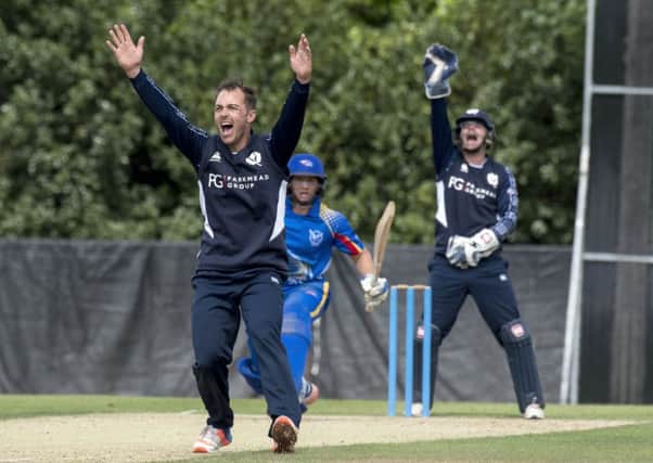 Scotland bowler Con de Lange appeals for lbw to claim the wicket of Namibia batsman Zane Green.  Pic: Donald MacLeod