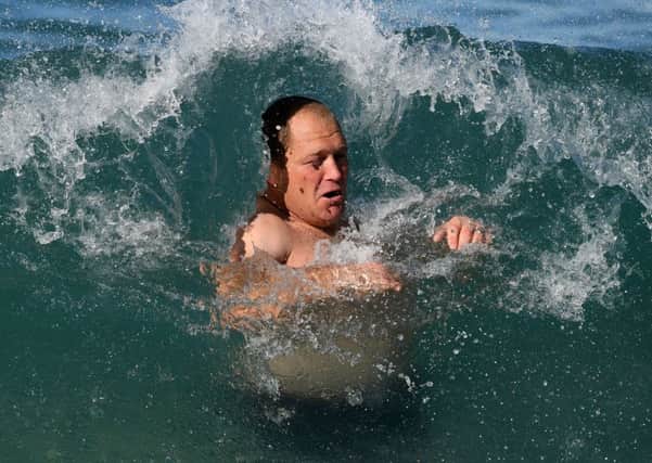 Scotland's WP Nel enjoys a recovery session in the sea off Coogee Beach. Pic: Fotosport/David Gibson